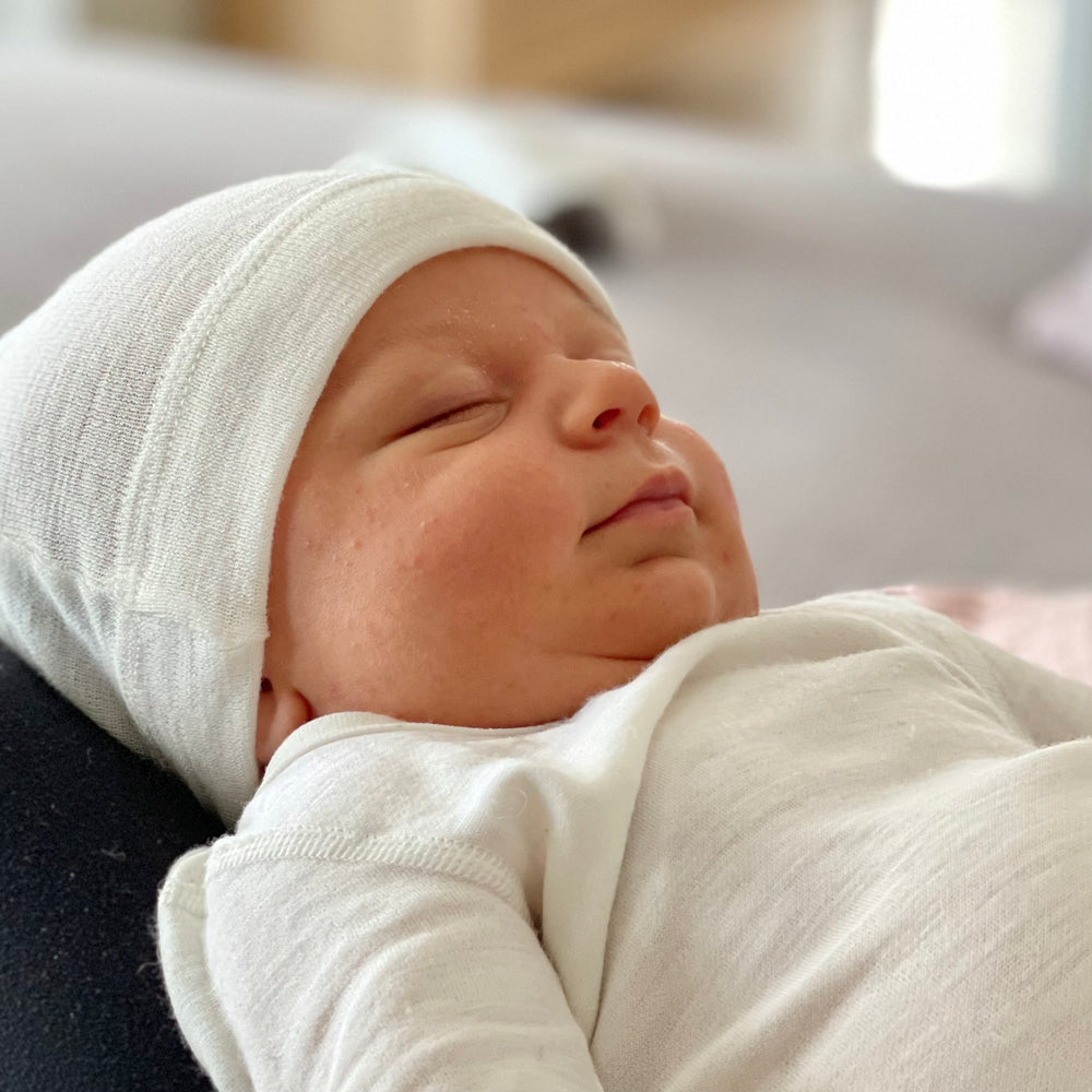 Nyfødtlue i merinoull